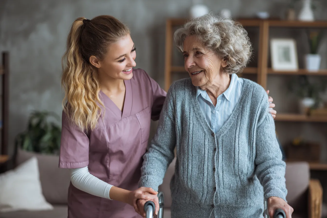 Caregiver helping senior walk