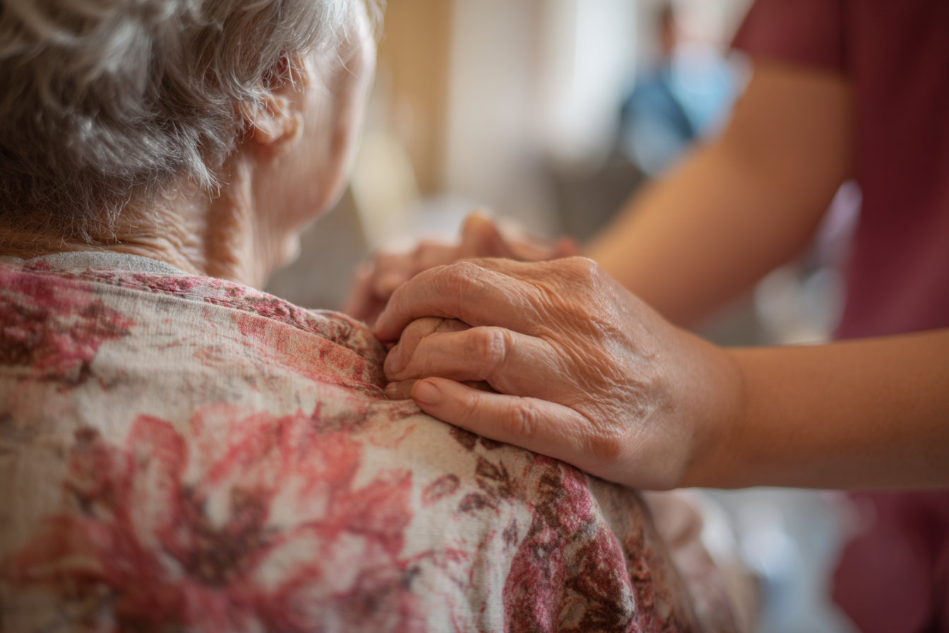 Home Care Caregiver comforts senior in heart failure care program